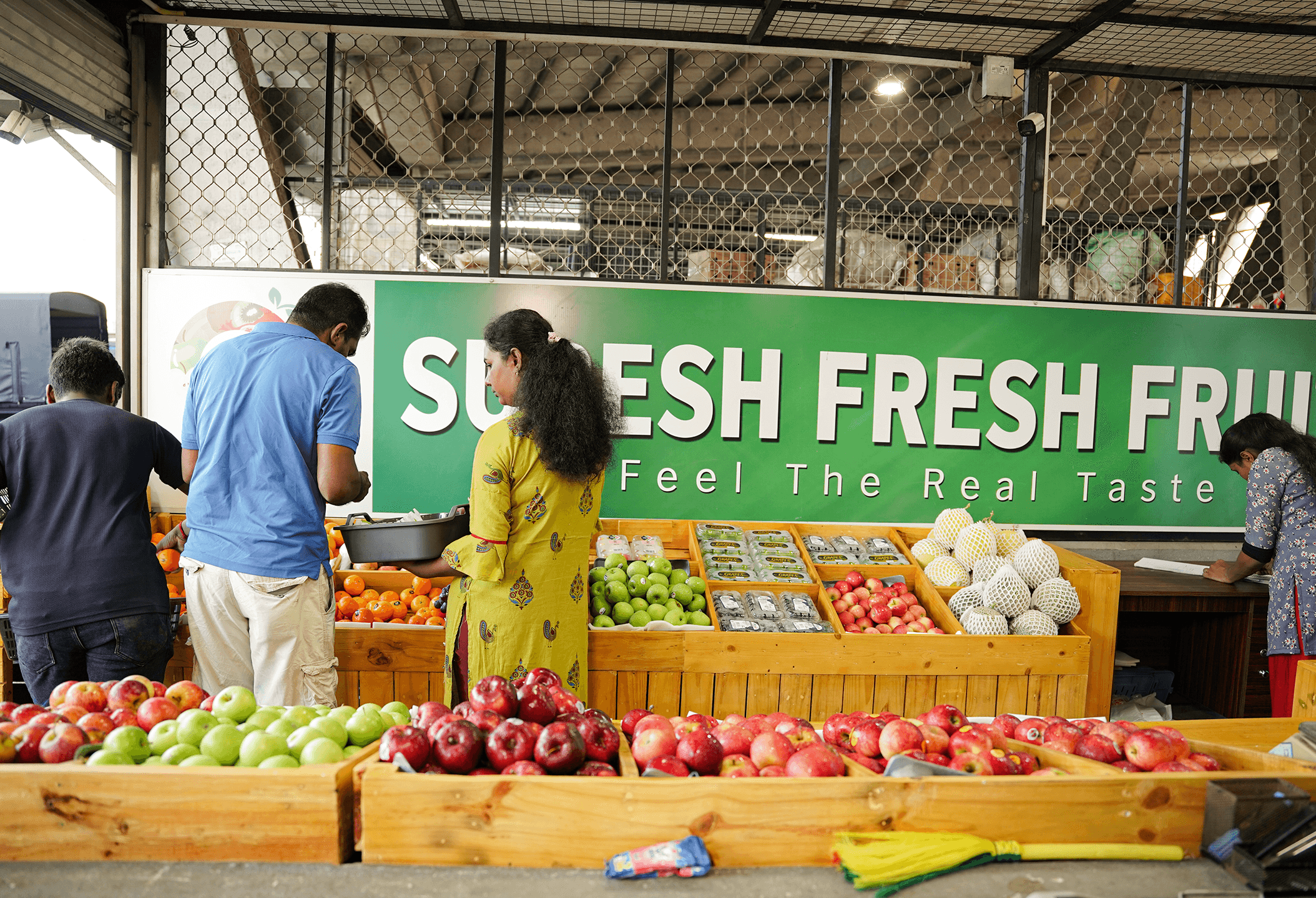 Fresh fruit crates lined up for wholesale and hotel supply
