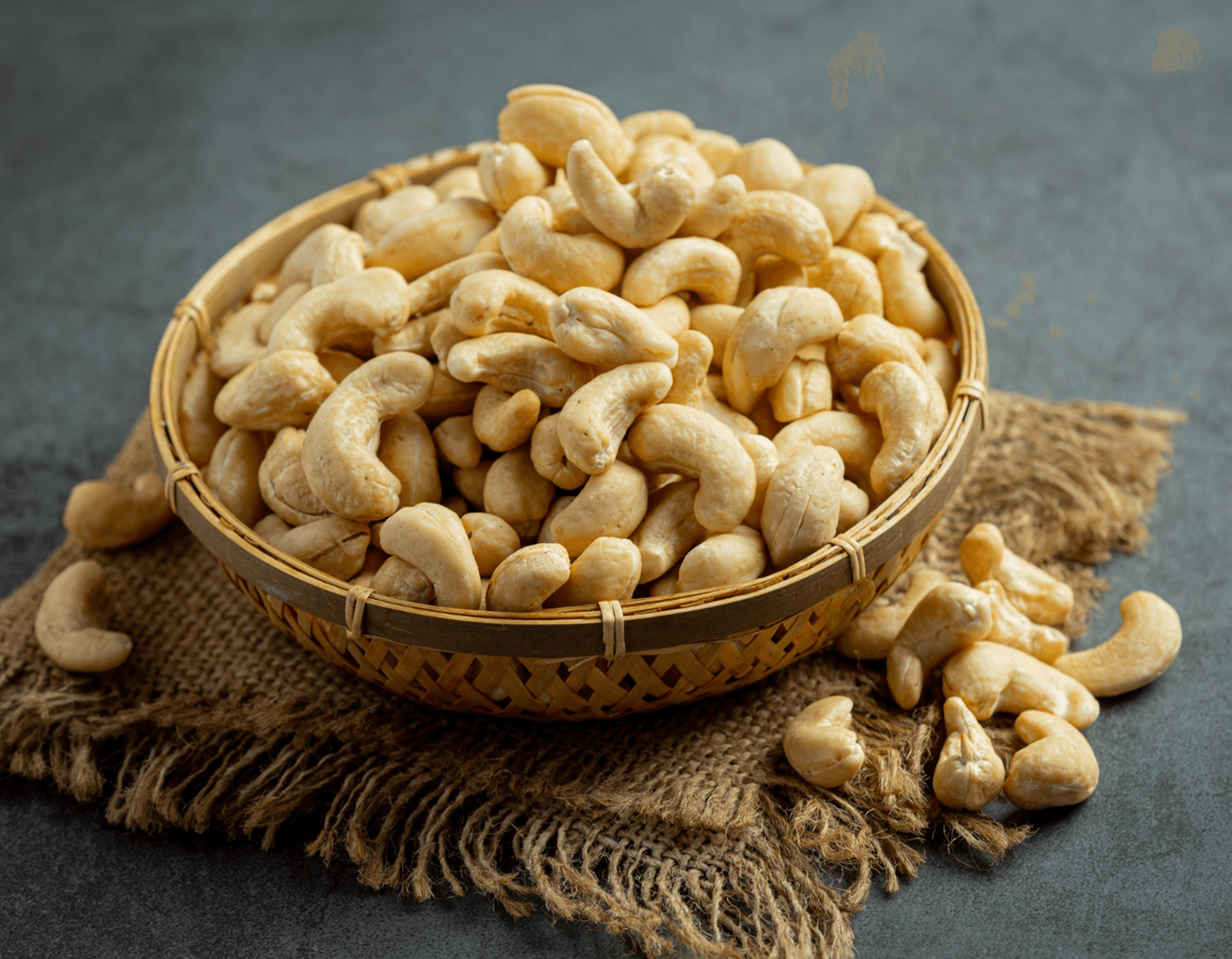 Shelled cashew nuts in a woven basket for commercial supply